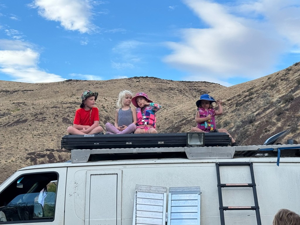 Kids on the van roof
